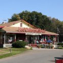 We pass the Red Caboose Motel as we pull out of the station